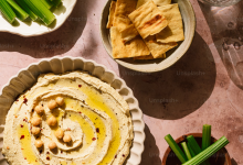 Display of Store-Bought Hummus Tubs
