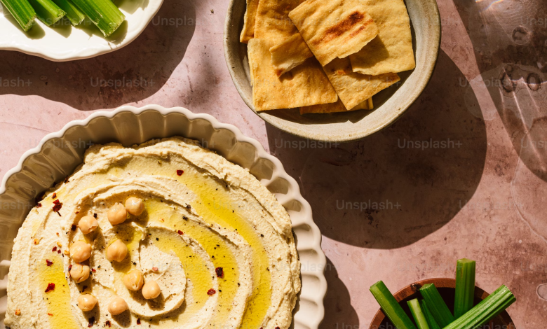 Display of Store-Bought Hummus Tubs