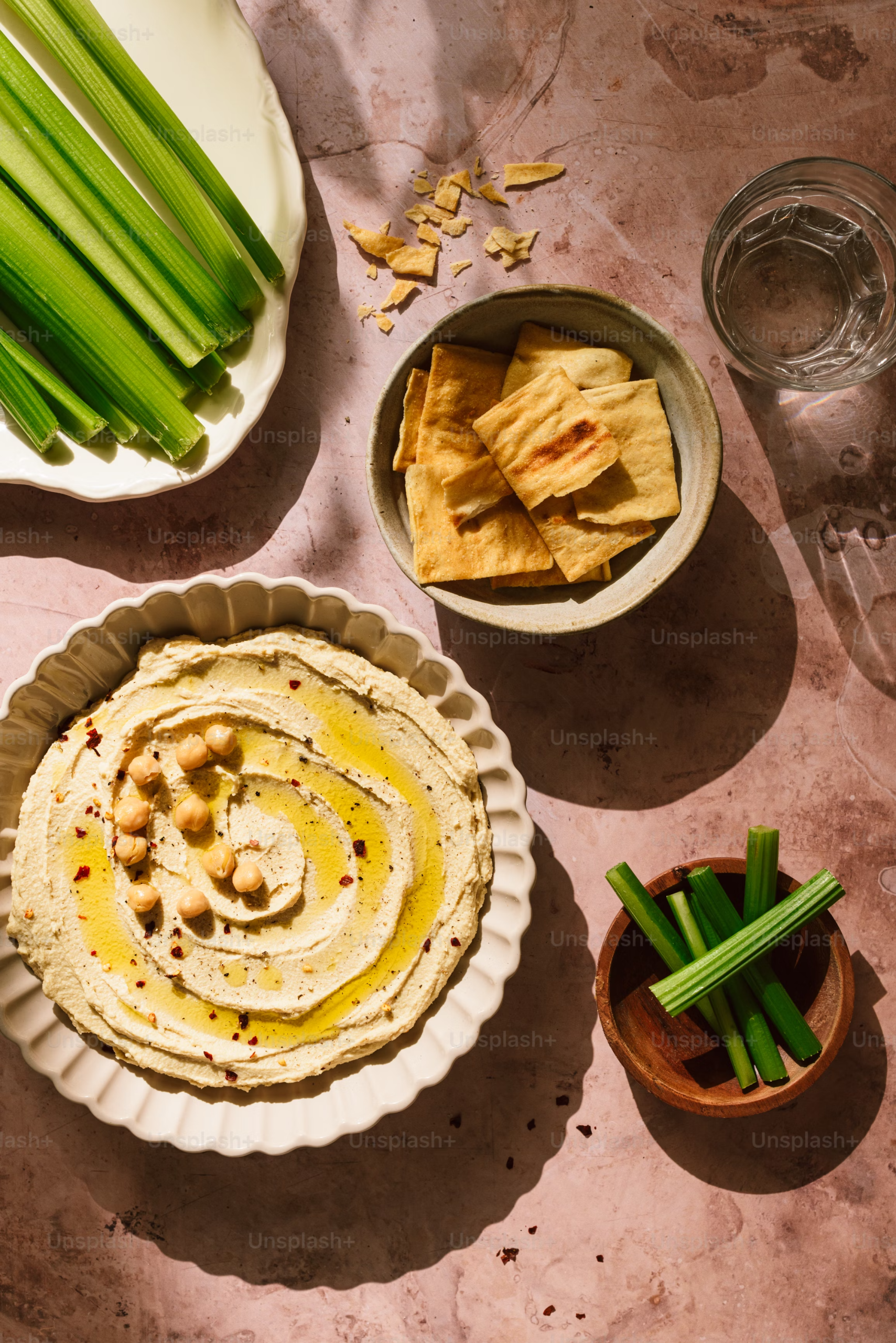 Display of Store-Bought Hummus Tubs