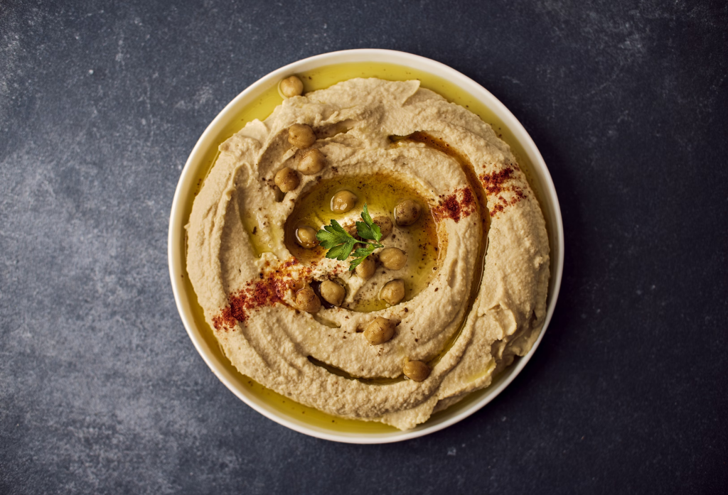 Traditional Hummus Bowl with Olive Oil and Paprika