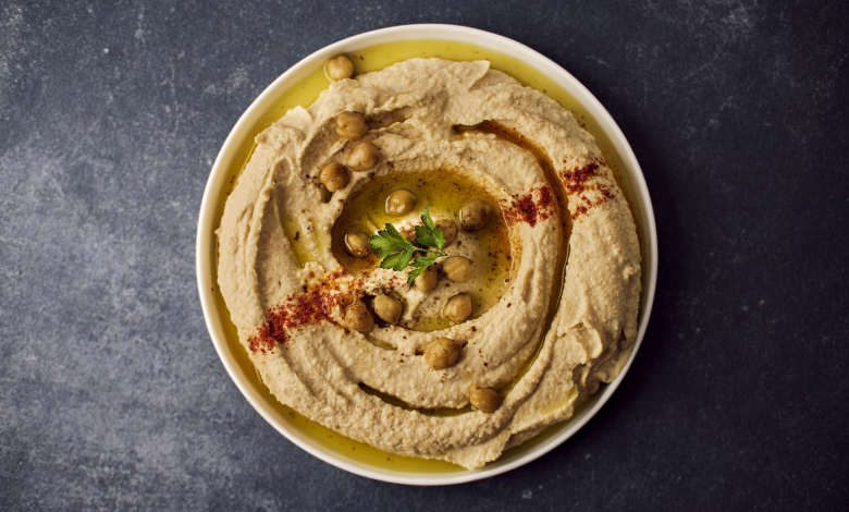 Traditional Hummus Bowl with Olive Oil and Paprika
