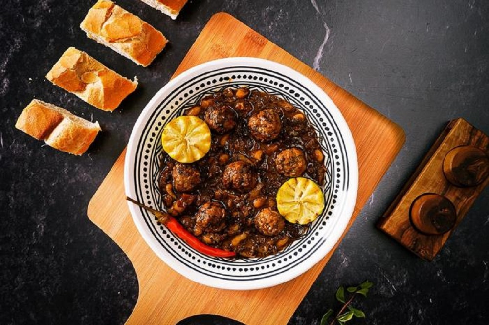 Madfouna, Tunisia’s traditional buried stew of meat, spices, and vegetables.