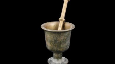 the traditional Arabic cooking tools — mortar, sieve, and saj