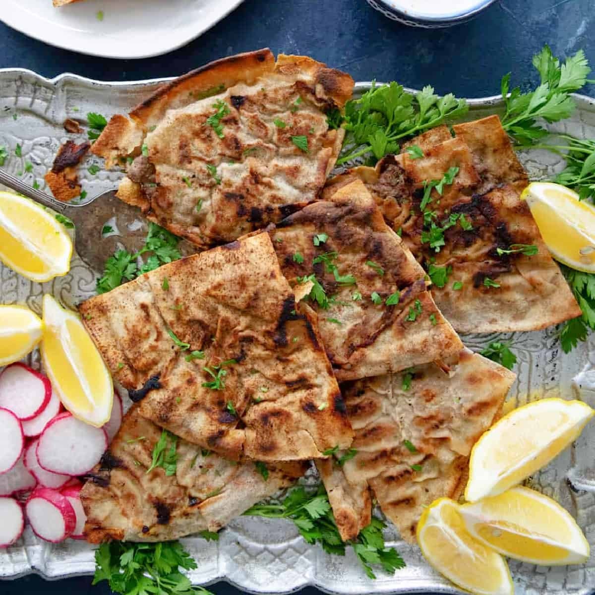 Arayes Lahmeh, a beloved Middle Eastern meat-stuffed pita, with this easy step-by-step recipe that brings authentic Arabic flavor to your kitchen.