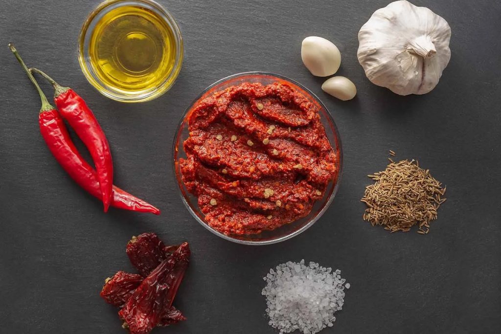 Tunisian cuisine is a vibrant fusion of North African, Mediterranean, Arab, and Berber influences—famous for its bold flavors, warm spice blends, and deep-rooted culinary traditions.
