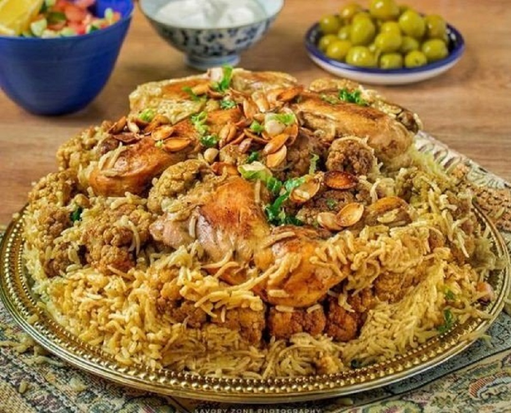 While Palestinian Maqluba emphasizes bold spices, fried vegetables, and a homely feel, Jordanian Maqluba is known for its cleaner flavor profile, subtle layering, and slightly more refined cooking style.