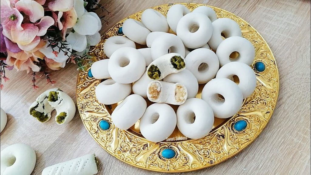 the history, symbolism, and artisanal preparation of Kaak El Warka, Tunisia’s paper-thin, almond-filled pastry rooted in royal, Andalusian, and Sufi traditions.