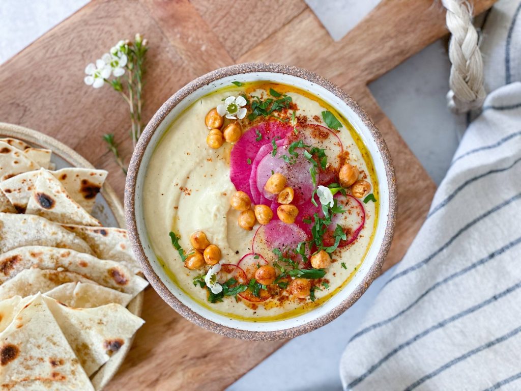 Hummus Republic is a fast-casual spot where you can build your perfect hummus bowl, wrap, or pita, combining fresh ingredients with bold flavors. 