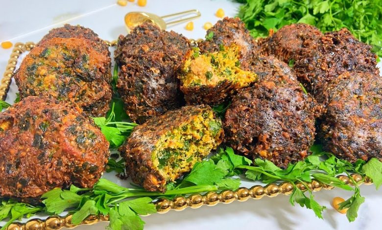 Chbetia is a savory Tunisian stew made with chickpeas, meat, and spices—not a dessert