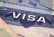 USCIS has reduced work permit validity from five years to 18 months, creating new financial and legal challenges for green card applicants.