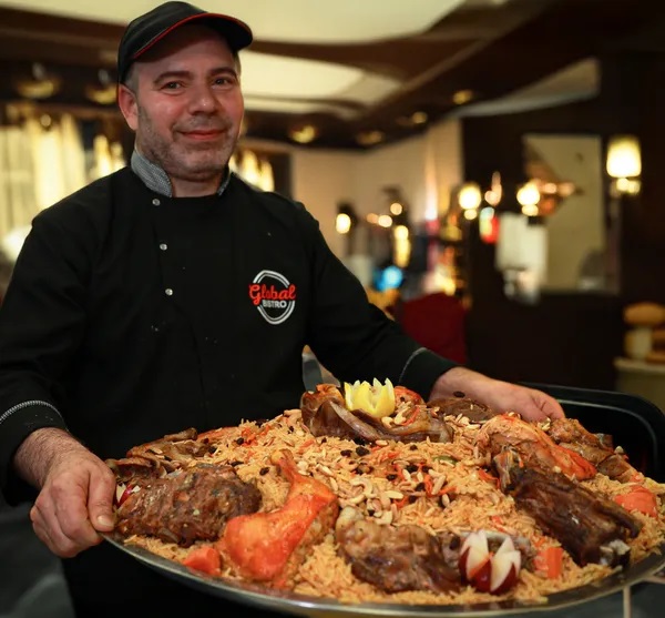 Abdulmueen Mubarak, widely known as Abu Yaman, is a Syrian immigrant whose love for cooking has turned into one of Virginia’s most heartwarming success stories.