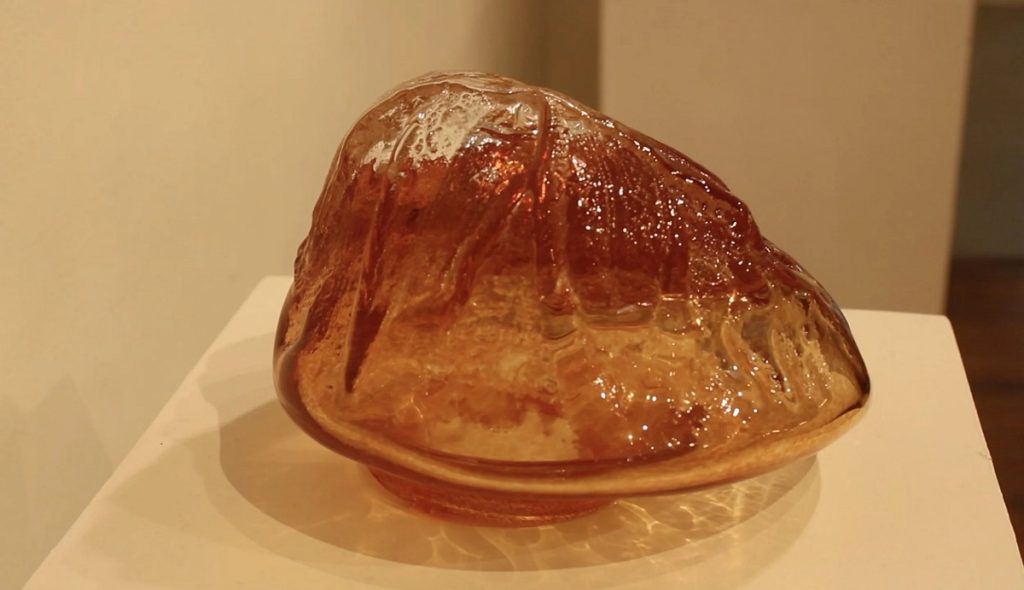 Glass has always been a material of contradictions: ancient yet overlooked, functional yet decorative, fragile yet enduring. In his first solo exhibition, “To Tie a Knot,” Lebanese-American artist Naz Khoury uses these contradictions to excavate questions of heritage, environmental extraction, and cultural erasure.