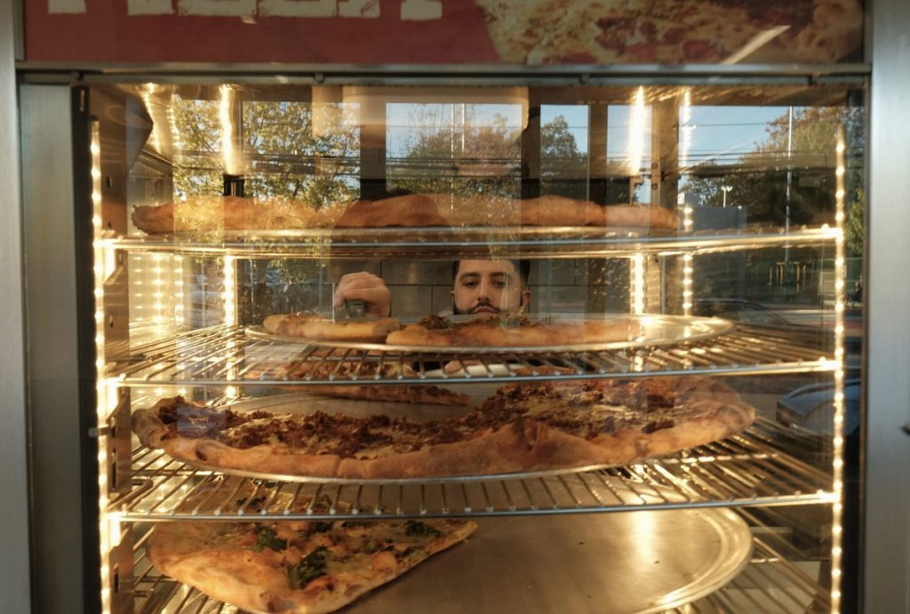 The Olive Branch Pizzeria in Philadelphia celebrates Palestinian heritage, supports Gaza, and shares authentic flavors rooted in family tradition.