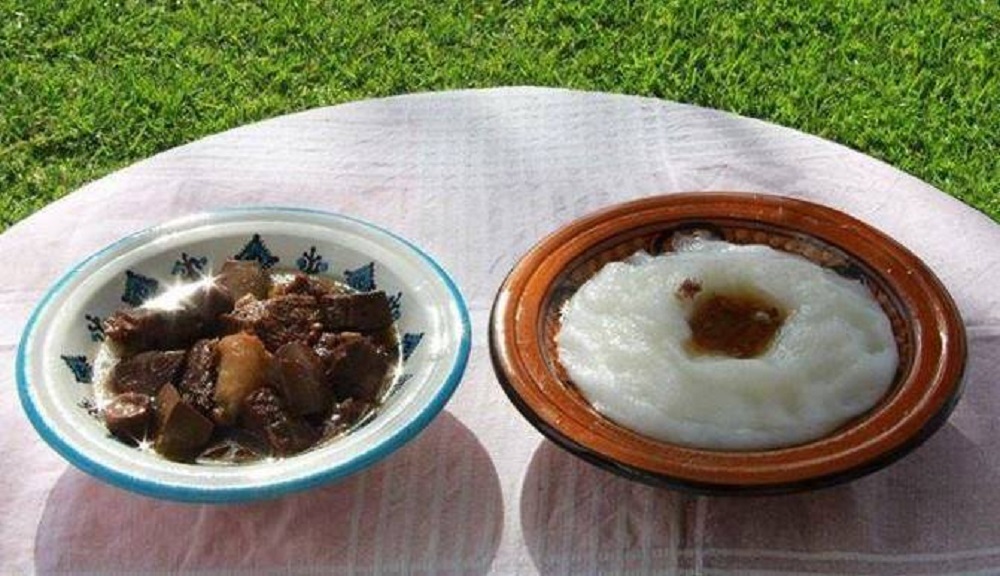 Tunisian Bazin, a traditional barley-based dish served with flavorful sauces. Explore its history, preparation, and cultural significance in Tunisia’s culinary tradition.