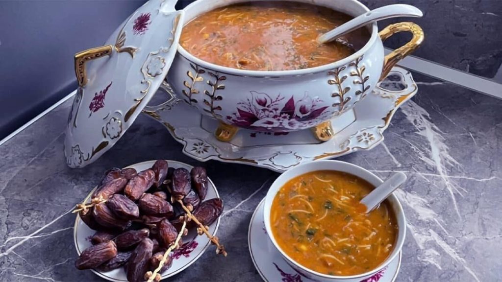 Moroccan Harira is a traditional halal soup made with tomatoes, lentils, chickpeas, herbs, and warming spices.
